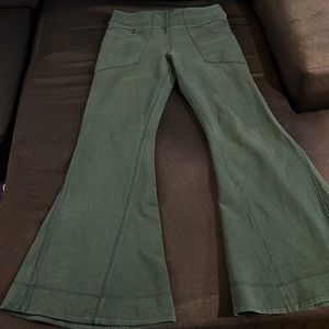 Free People Movement Forrest green jersey knit soft bell bottoms size M/L